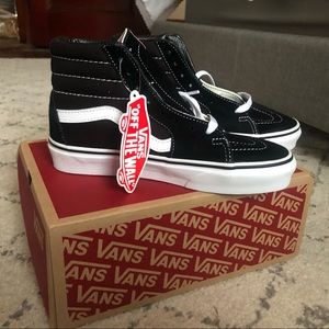 Women’s high top Vans Sneakers
